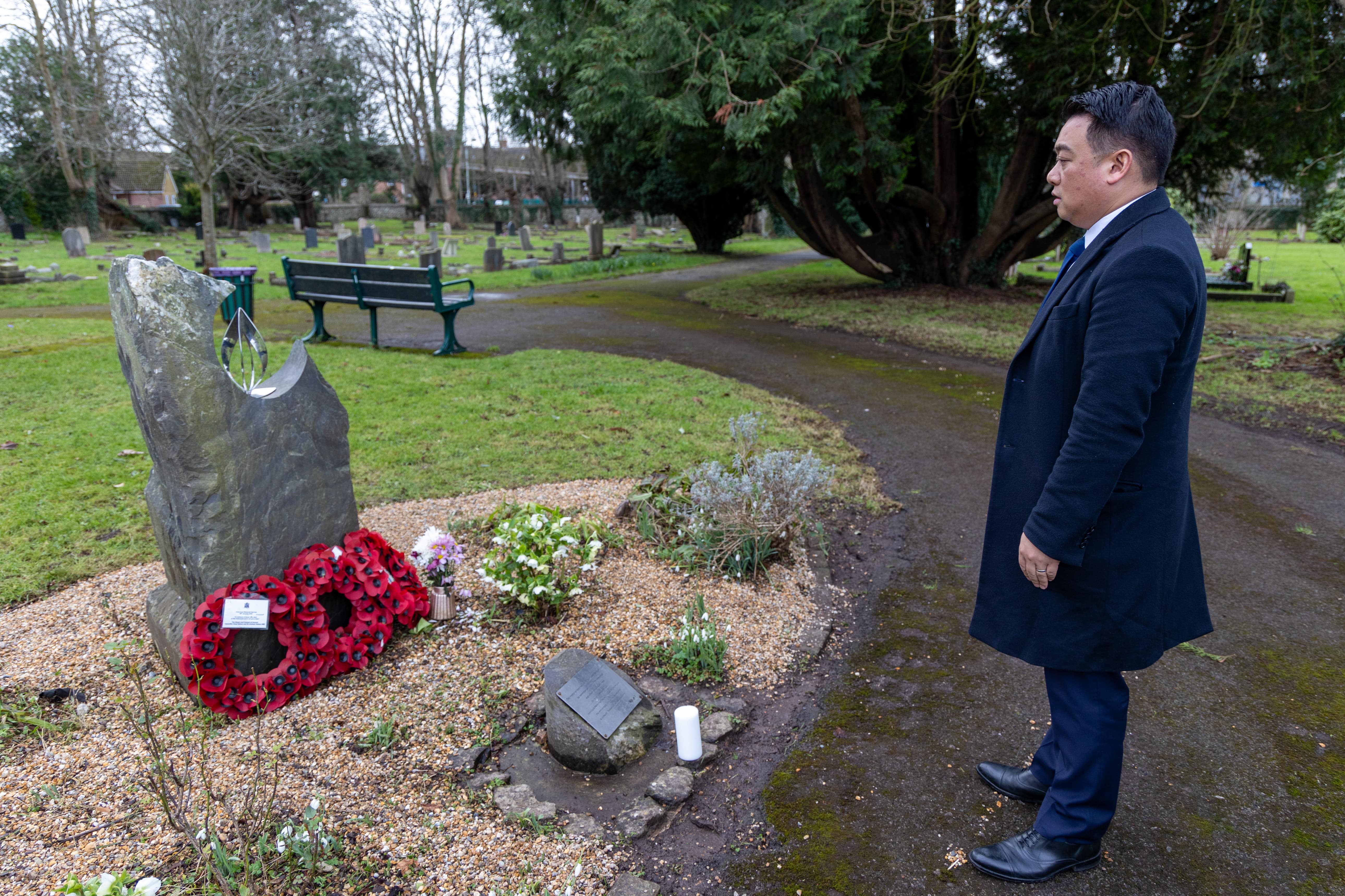 Local MP Alan Mak lights candle in Havant Cemetery to mark Holocaust ...