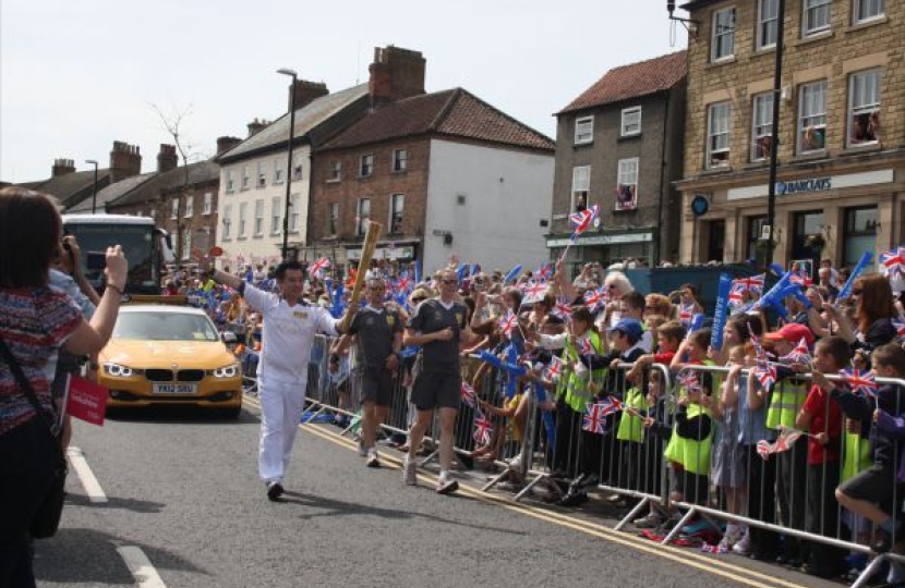 Alan Mak carrying the London2012 Olympic Torch