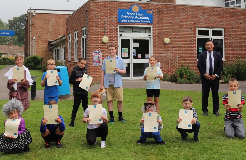 Alan presents his MP School Merit Awards to school children from Front Lawn Primary Academy who were dressed up as part of an event for AgeUK 