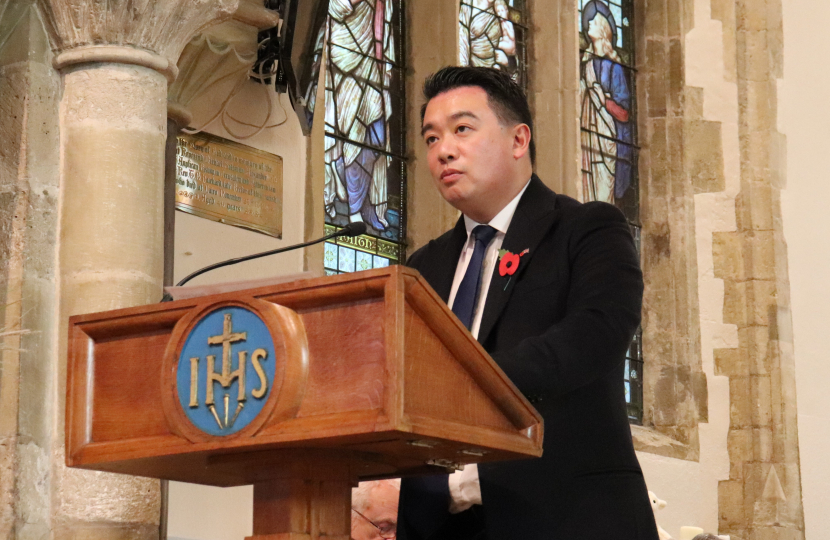 Local MP Alan Mak gives a reading at a Remembrance Sunday Service inside St Faiths Church.