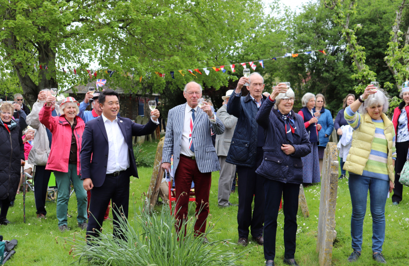 Local MP Alan Mak joins in a toast to His Majesty King Charles III [1]