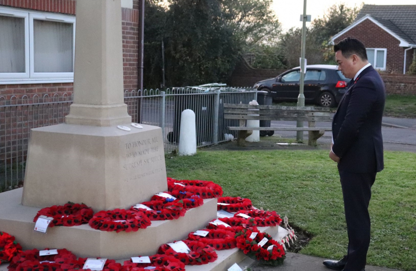 Local MP Alan Mak pays his respects at the Cenotaph on Elm Grove in Mengham.