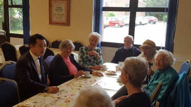 Alan Mak MP speaks to residents at Hayling Community Centre