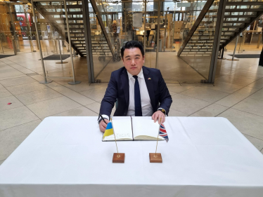  Local MP Alan Mak signs the Book of Solidarity in the House of Commons.