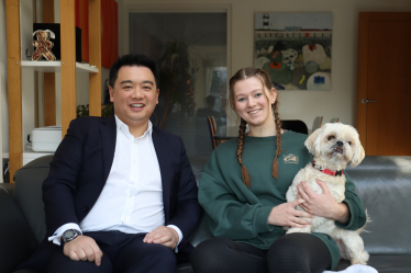 Local MP Alan Mak presents Jess Webb with a bottle of special House of Commons wine for her next fundraising event